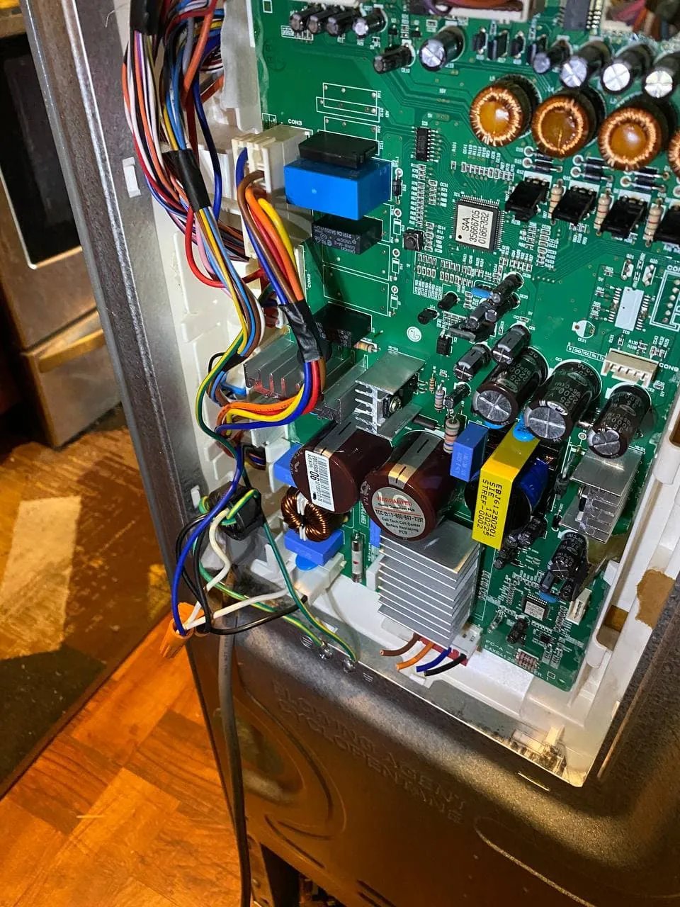 Refrigerator main control board with the wiring harness connected