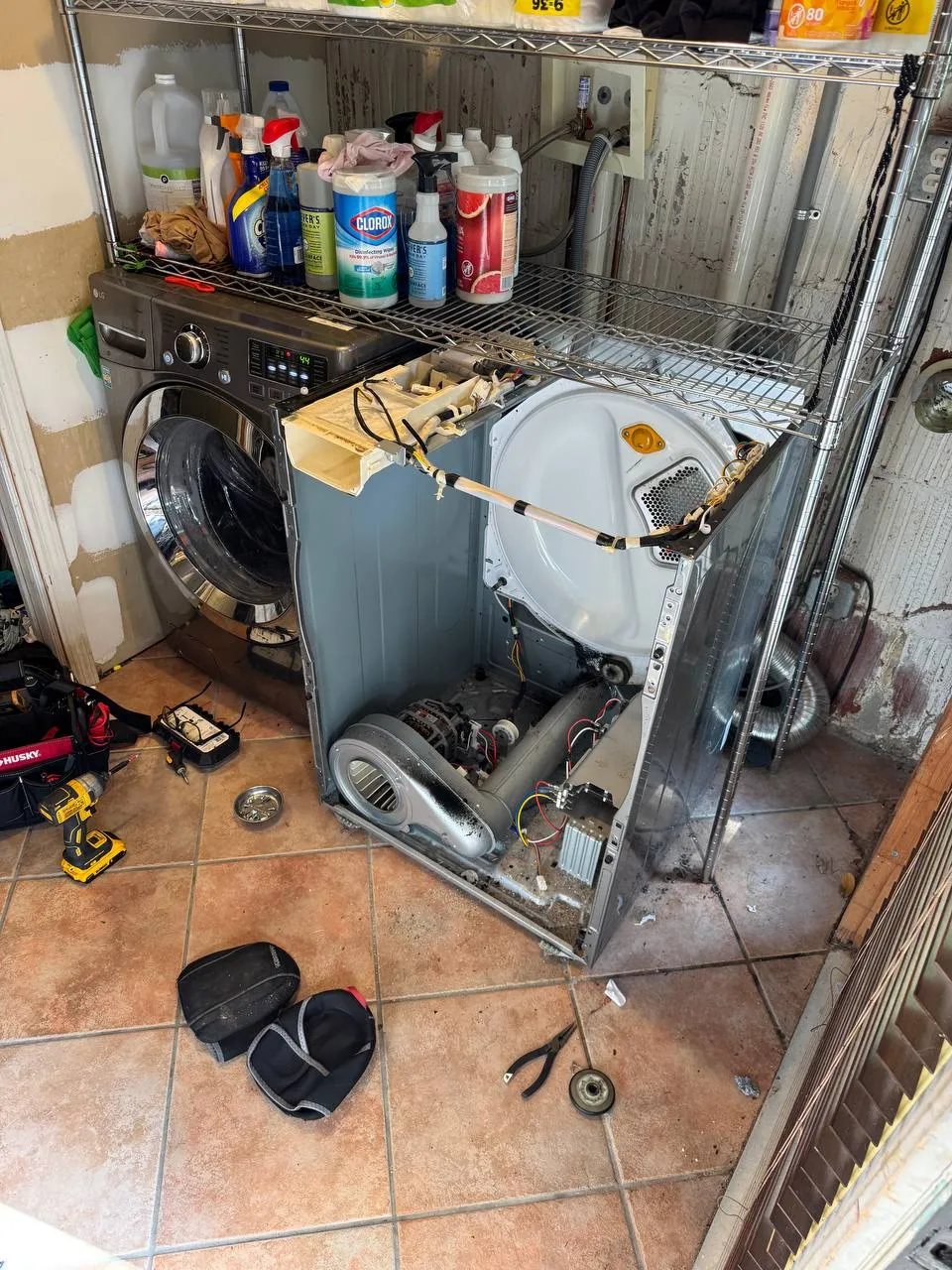 Dryer taken down to the frame with the drum, blower and vent duct out