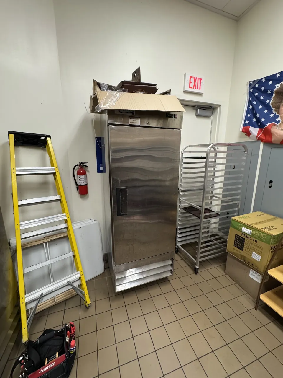 Commercial reach-in cooler in a bakery back room
