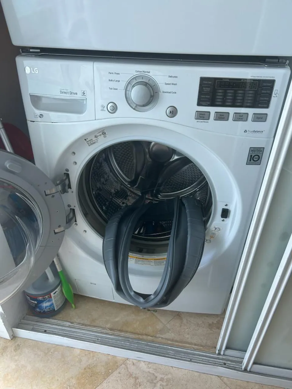 LG front-load washer with the door boot hanging into the drum