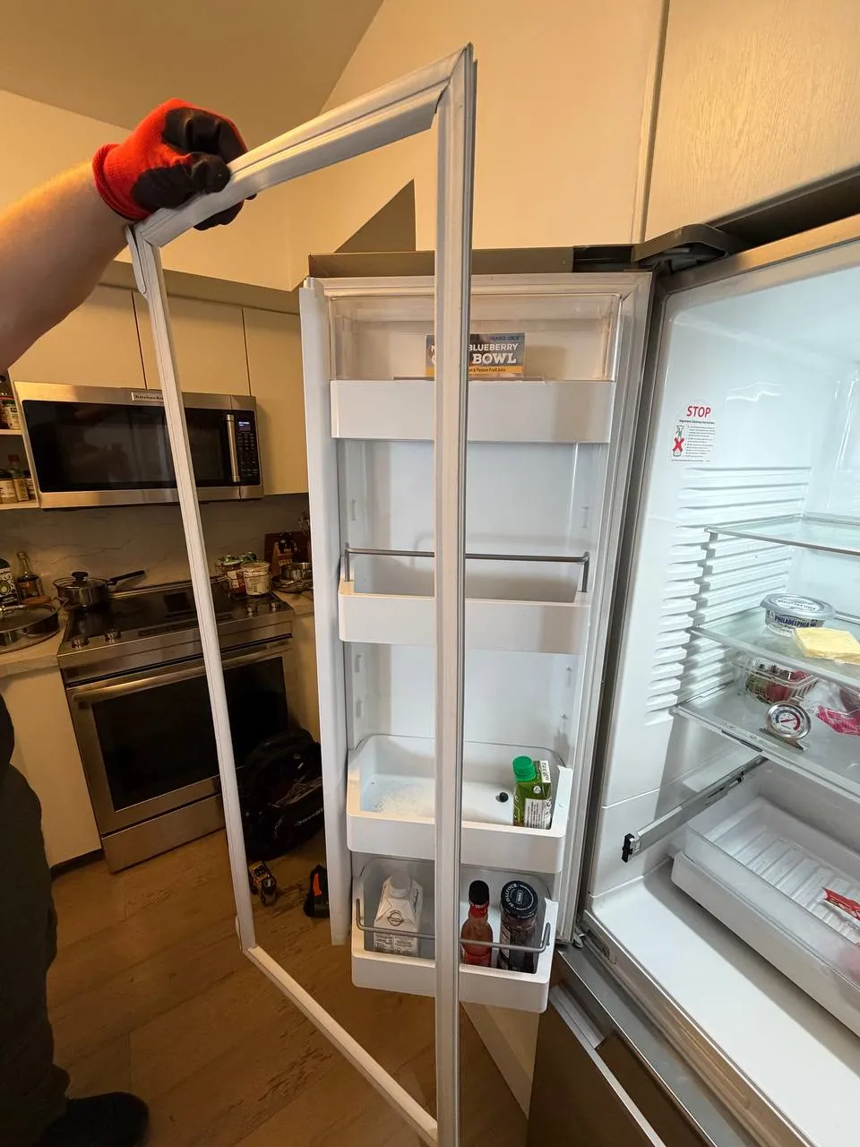 Electrolux refrigerator door open during a door gasket replacement