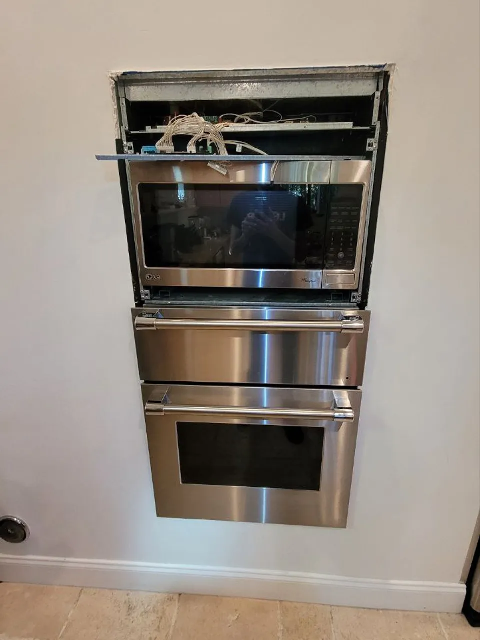 LG built-in microwave and oven combination in a kitchen