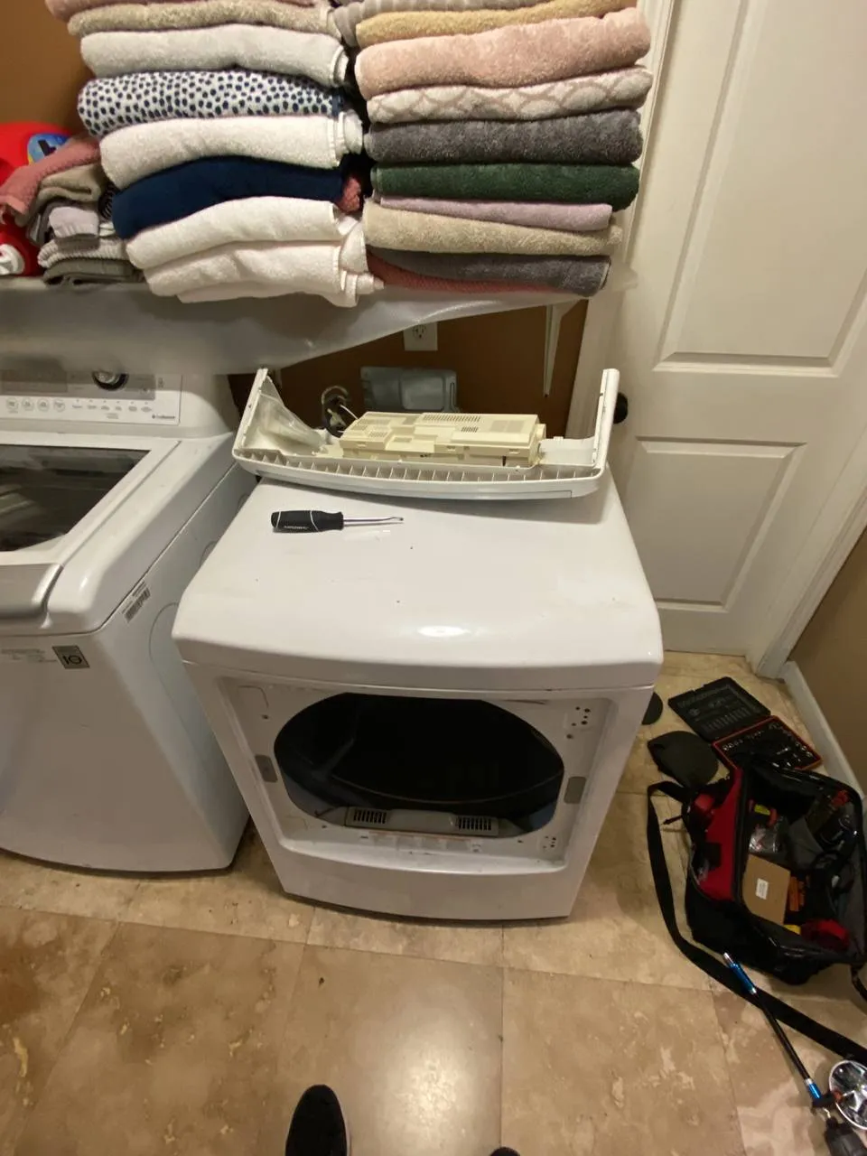 Kenmore dryer with the control board exposed during repair