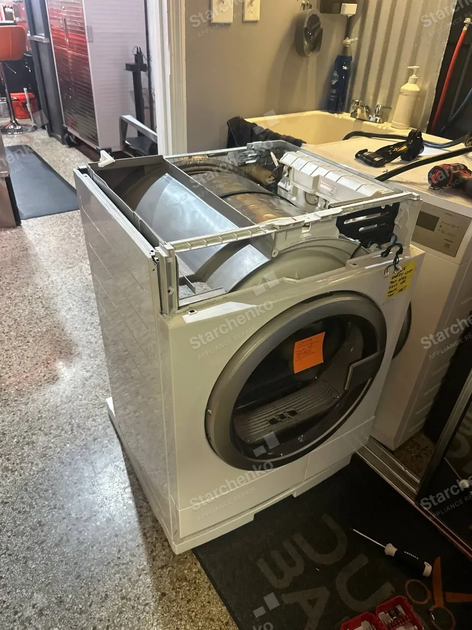 Electrolux dryer pulled forward and opened during a user interface board replacement