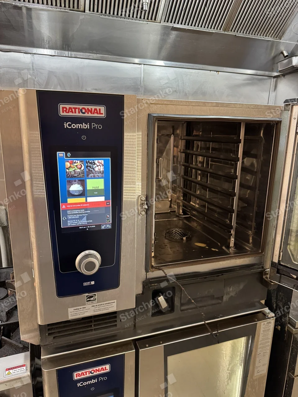 Rational iCombi Pro combi oven with the door open and a fault message on the screen