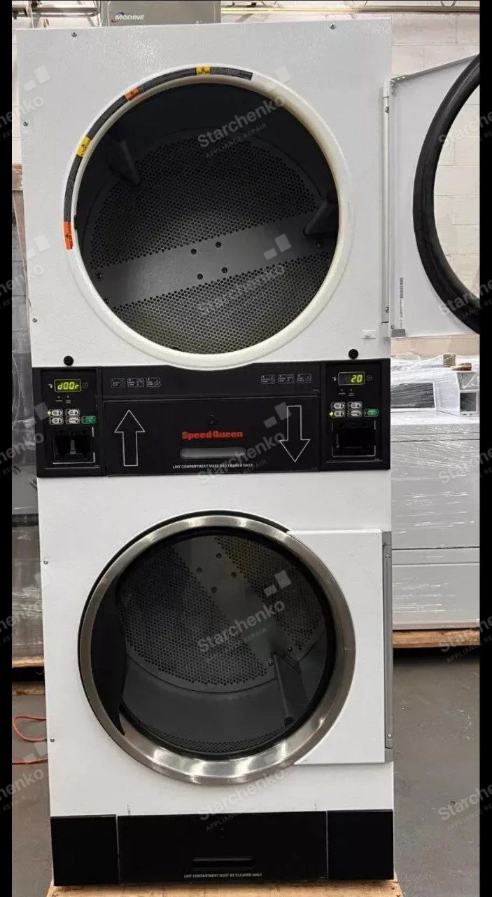 Speed Queen repair: Two vertically stacked commercial dryer drums and coin controls, upper door open.