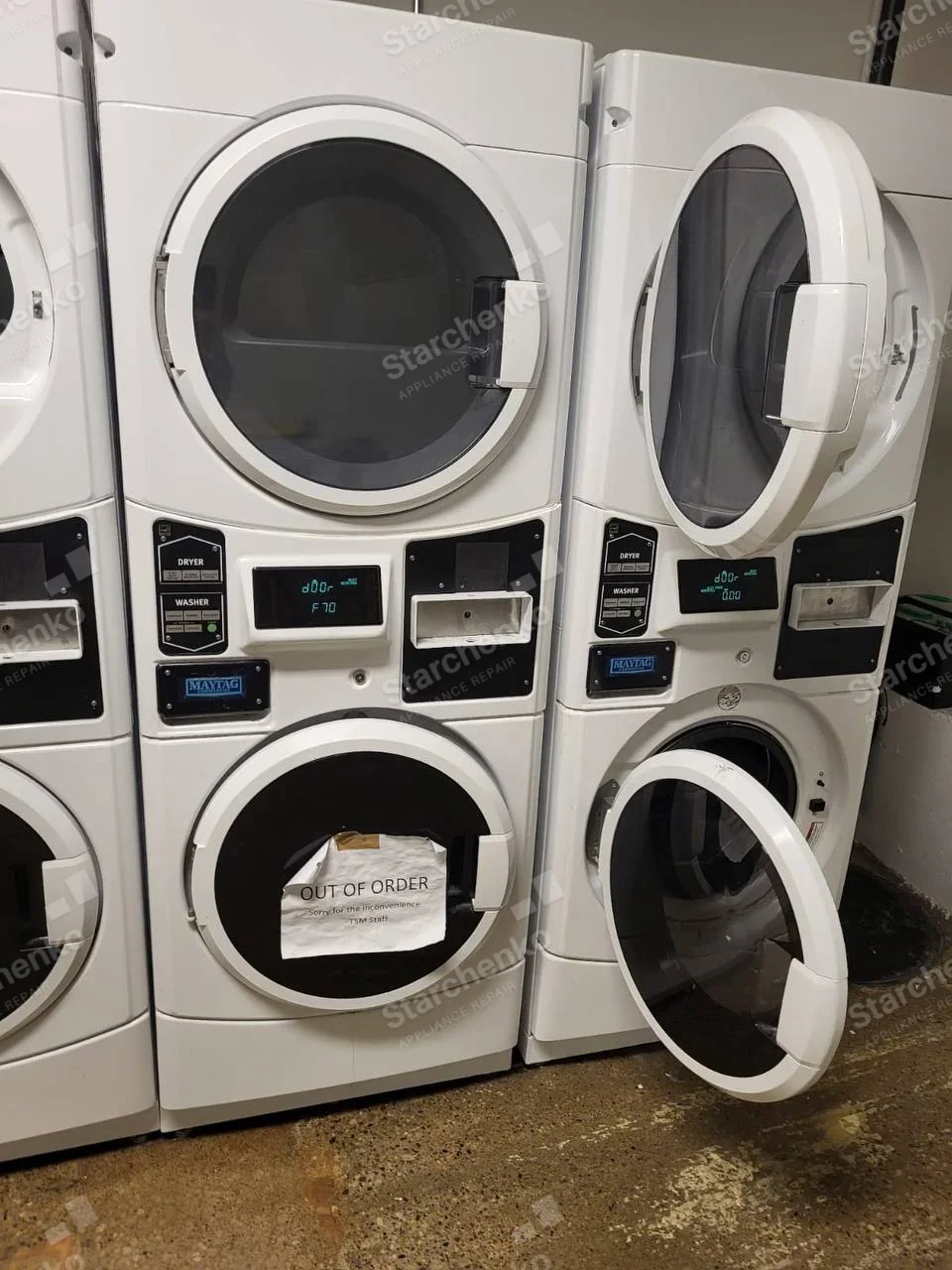 Maytag Commercial repair: Maytag badges on stacked laundry machines, right-hand lower washer door open, upper dryer door also open.