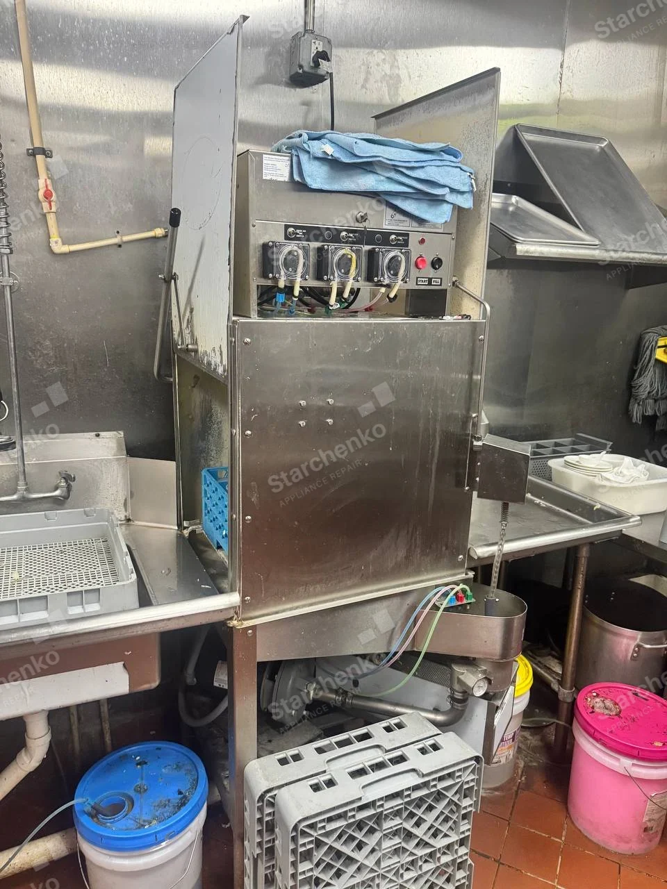 Meiko repair: Commercial pass-through dishwasher with chemical pumps and lower motor access, no reliable main maker badge.
