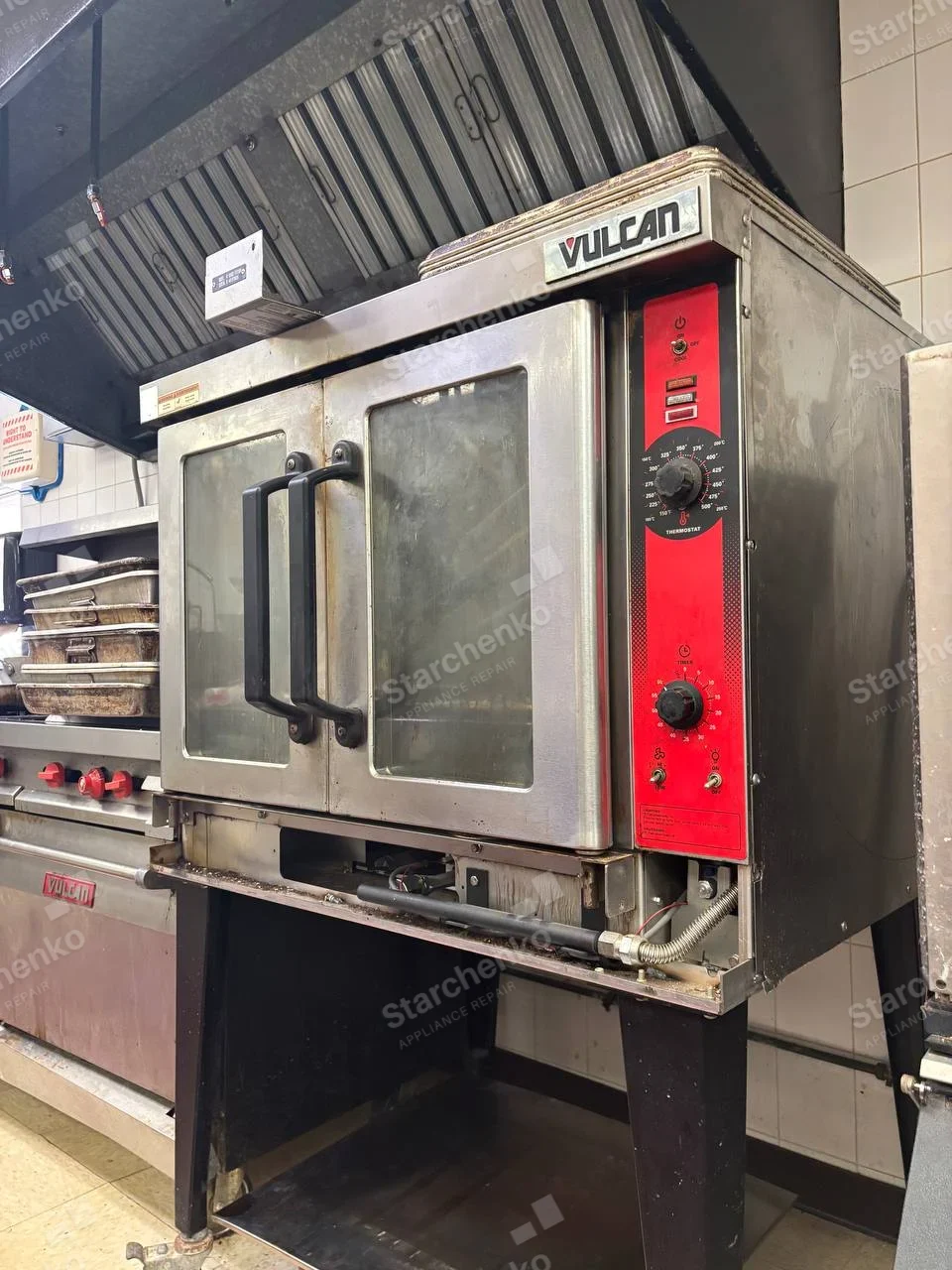 VULCAN wordmark on upper-right front of the main commercial convection oven.